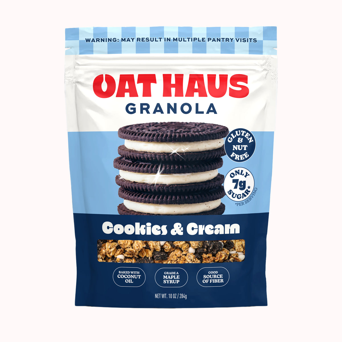 Oat Haus Granola Cookies & Cream flavor in a 10 oz stand-up pouch. The packaging features a white top section with blue stripes, bold red and blue 'OAT HAUS GRANOLA' branding, an image of a stack of cookies and cream sandwich cookies, a 'Cookies & Cream' label, and a clear window showing the granola inside.